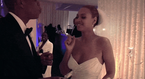 Beyonce and Jay Z kissing at their wedding