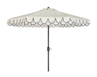 A decorative patio umbrella with scalloped edges