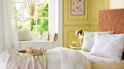 Yellow bedroom with Aldi cooling bedding