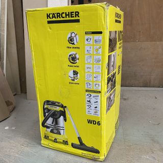 Kärcher WD 6 P Premium Wet and Dry Vacuum Cleaner box on dusty warehouse floor