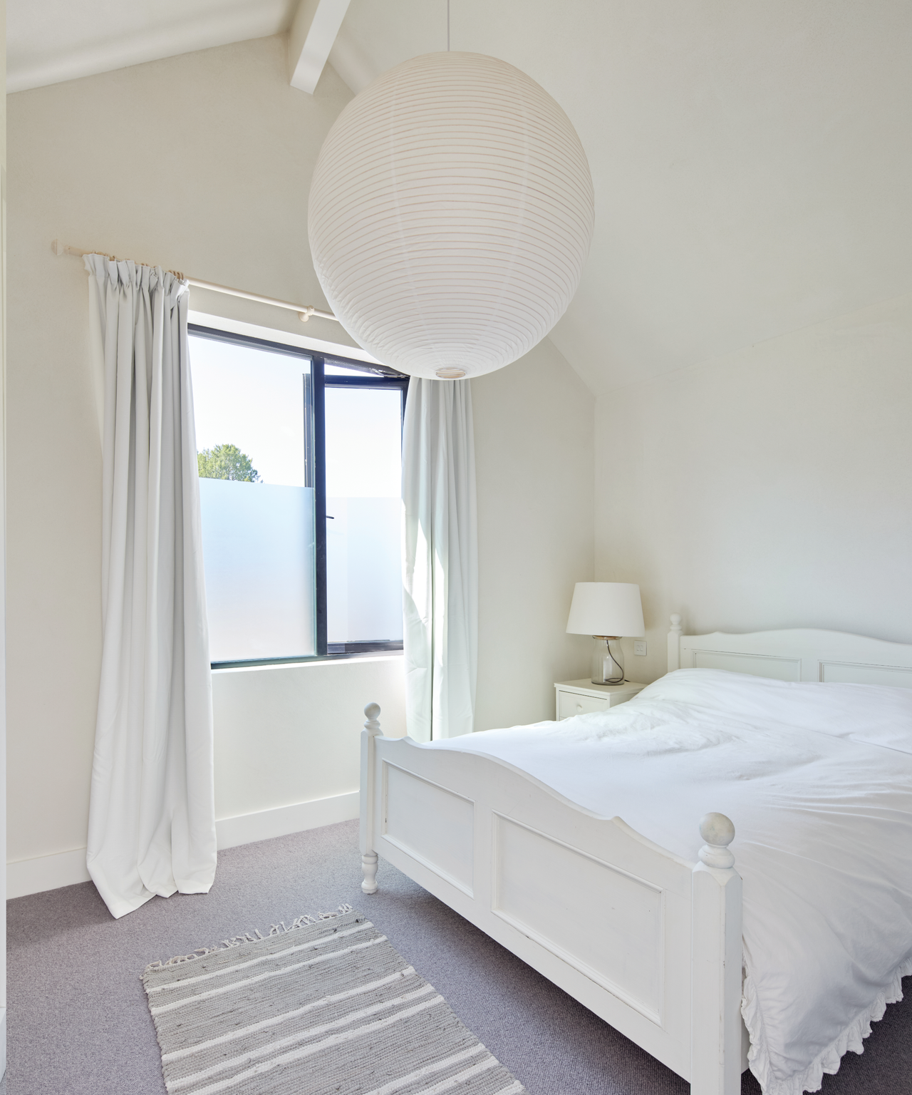 White bedroom with window