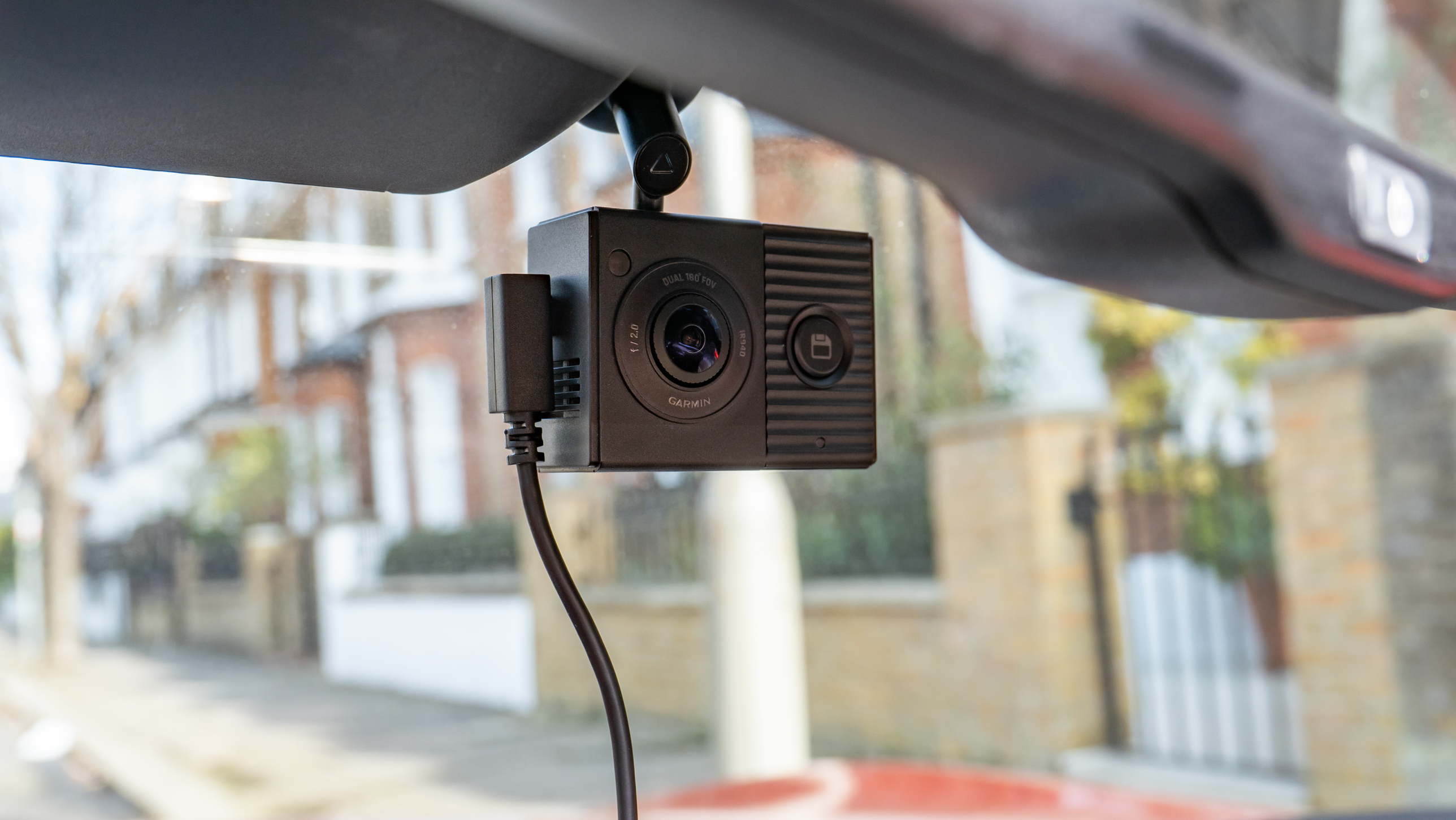 The Garmin Dash Cam Tandem mounted in a windshield