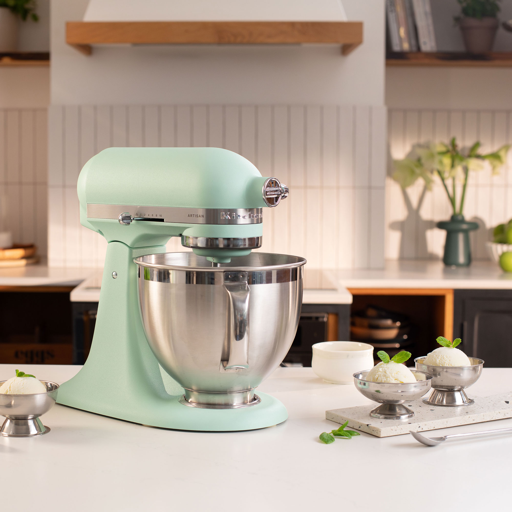 Spearmint KitchenAid in an orange kitchen