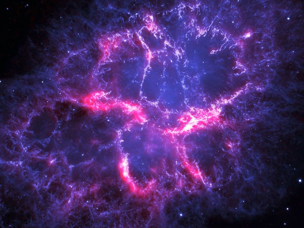 This gorgeous photo of the famous Crab Nebula combines an infrared view from ESA&#039;s Herschel Space Observatory with an optical image from the NASA/ESA Hubble Space Telescope.