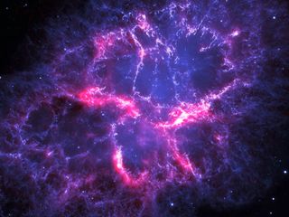 This gorgeous photo of the famous Crab Nebula combines an infrared view from ESA's Herschel Space Observatory with an optical image from the NASA/ESA Hubble Space Telescope.