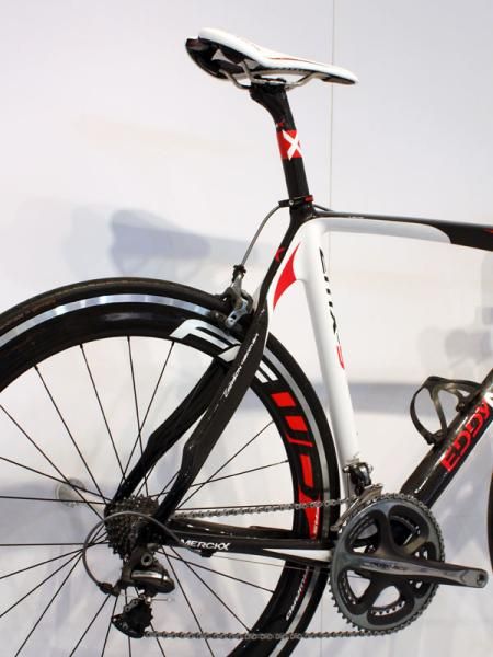 The Eddy Merckx EMX-5 flagship uses the company's highest grade of carbon fiber and a tapered front end.