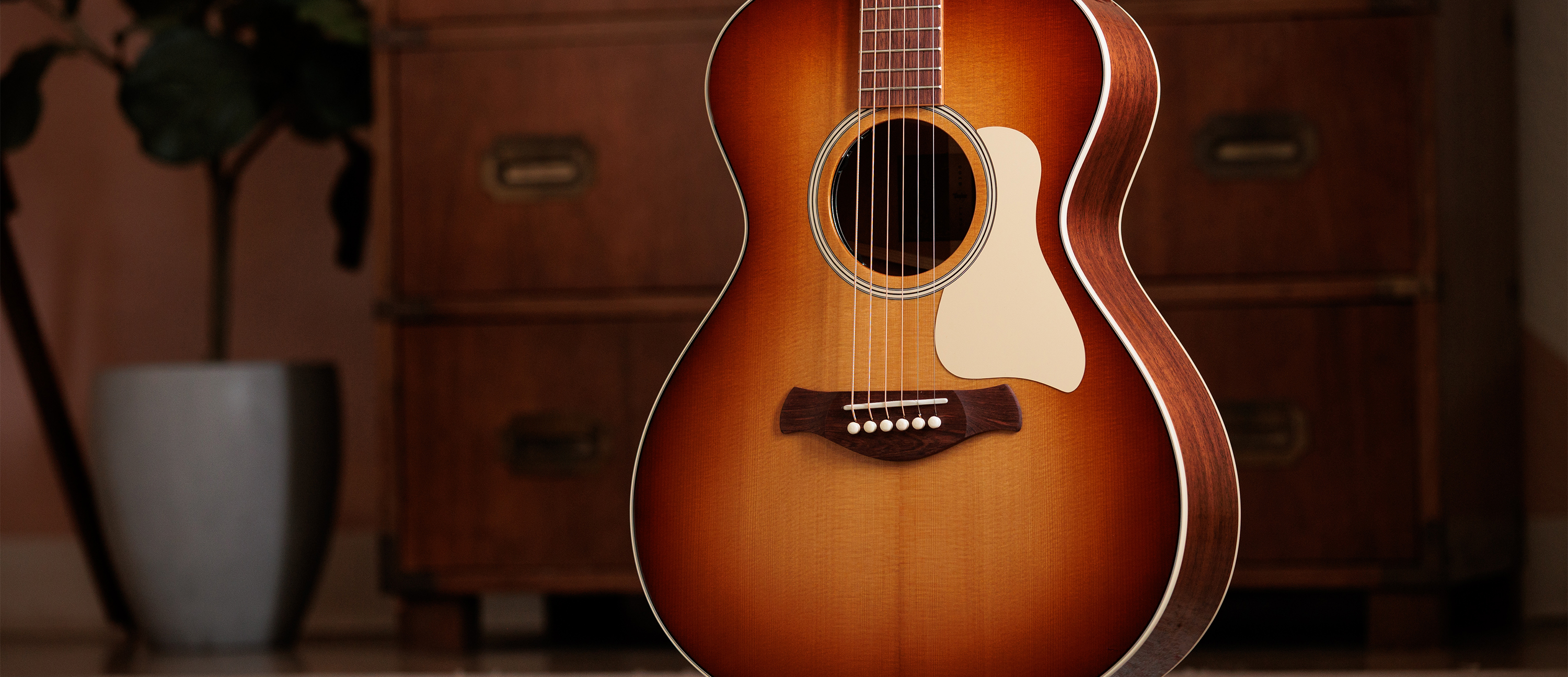 A photo of the Taylor Ben Harper Gold Label 512e Special Edition grand concert acoustic