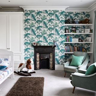 kids room with printed walls and fireplace