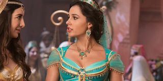 naomi scott as princess jasmine talking to her handmaiden in Aladdin