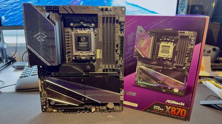 A photo of the ASRock Phantom Gaming X870 Nova WIFI motherboard, next to its retail packaging