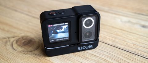 SJCAM SJ20 Dual Lens Action Camera on a wooden floor