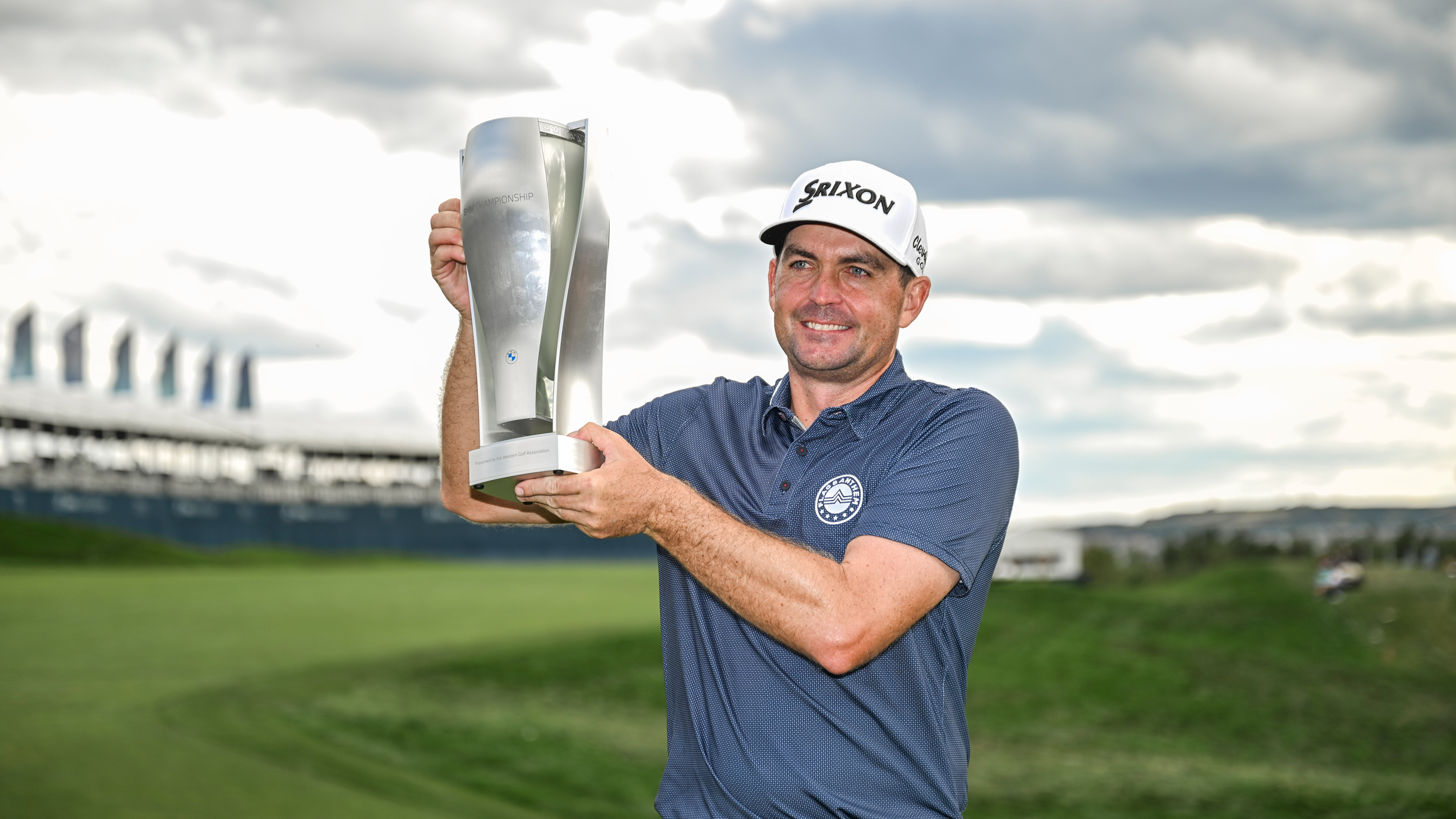 Keegan Bradley holds up the BMW Championship trophy after his win in 2024