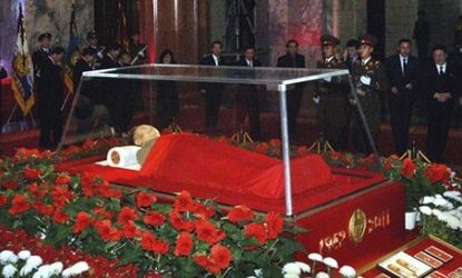 The body of Kim Jong Il lies in state at the Kumsusan Memorial Palace in Pyongyang: A top South Korean spy doesn't think the Dear Leader's death was really spurred by too much hard work. 