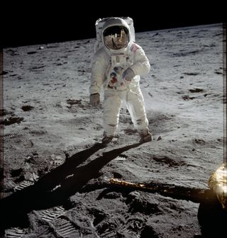 Astronaut Buzz Aldrin in his iconic Apollo spacesuit poses for a portrait on the moon during the Apollo 11 lunar landing mission in July 1969. The technology behind the Apollo spacesuit is still in use today on Earth.