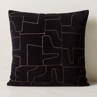 black square patterned pillow