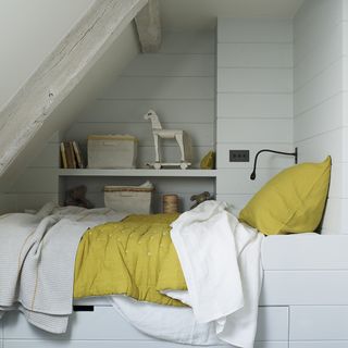 attic children room with yellow cushion