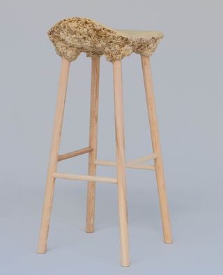 ’Well Proven Stool’ by van Aubel & Shaw, white background, tall wooden stool with bespoke design drift wood effect seat