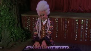 Paul Shaffer in a wig playing keyboard in Blues Brothers 2000