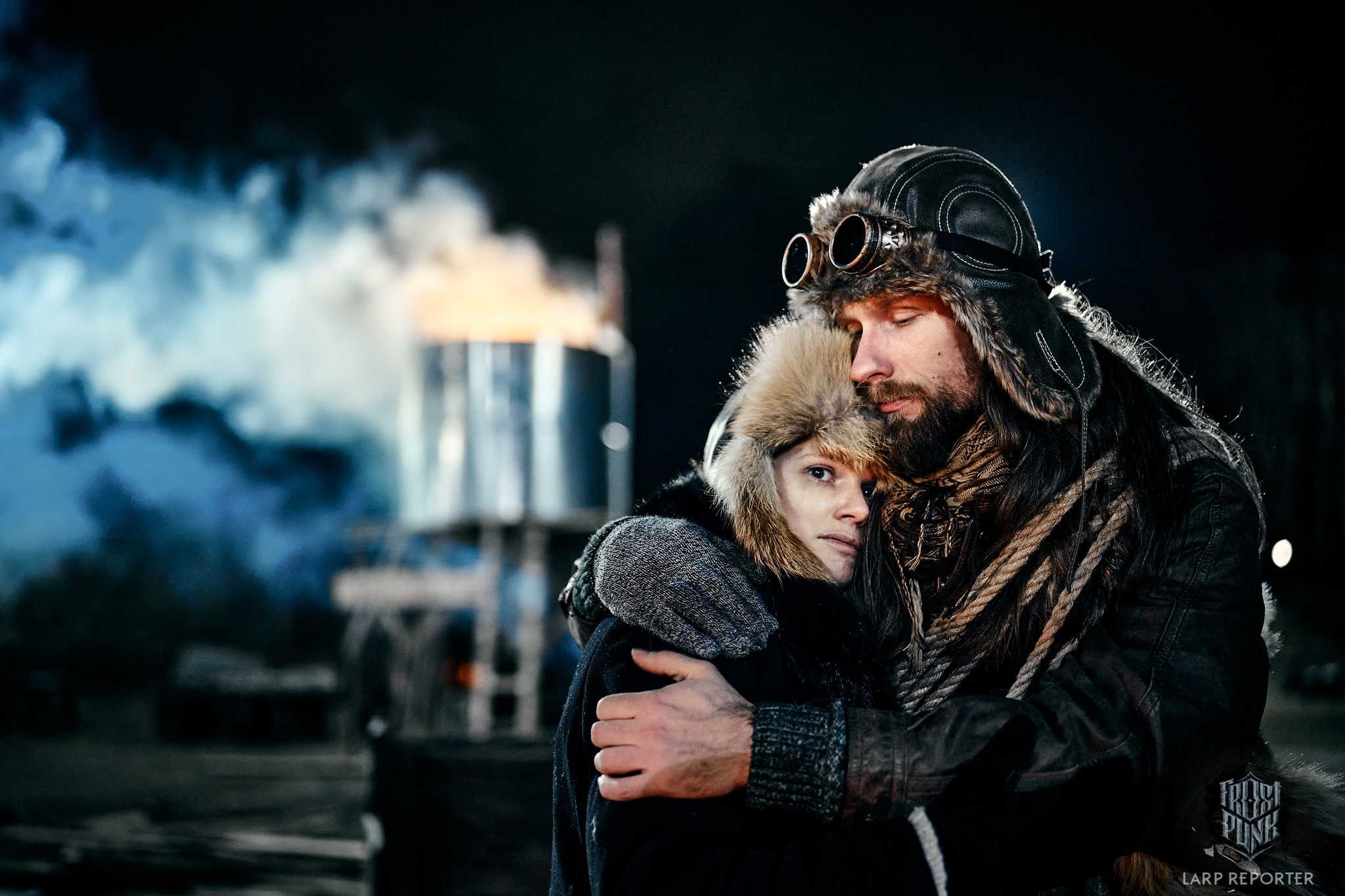 Man and woman cling together for warmth.