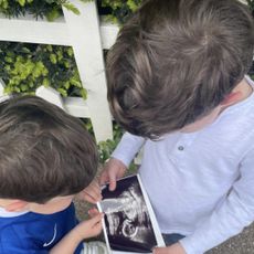 Ernest and August Brooksbank holding an ultrasound