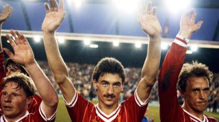 LIVERPOOL, UNITED KINGDOM - MAY 15: Liverpool players Sammy Lee (l) Ian Rush (c) and Phil Neal wave to the crowd after a League Division One match between Liverpool and Norwich City at Anfield on May 15, 1984 in Liverpool, England. (Photo by Mike Powell/Allsport/Getty Images)