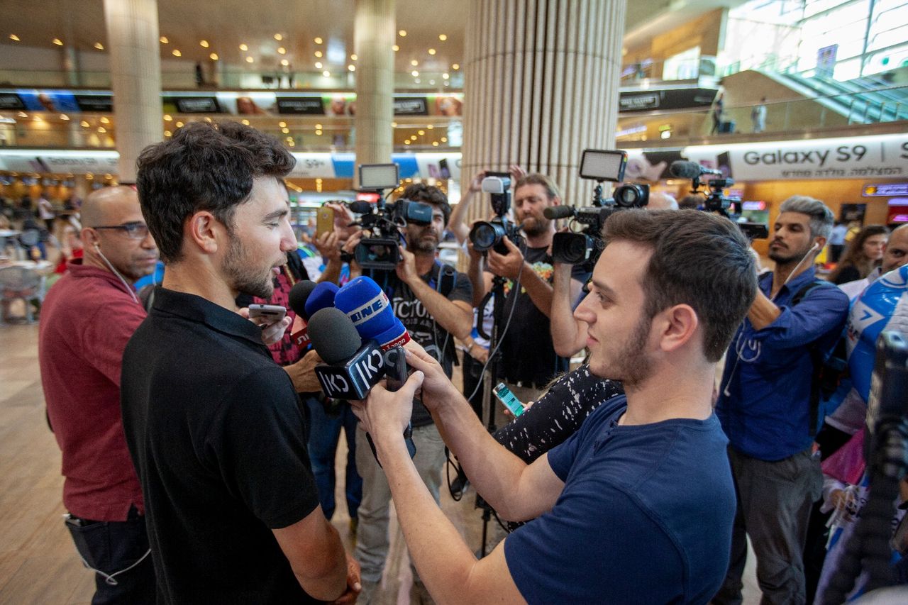 Guy Sagiv does an interview for Israeli TV after his return from the Giro d'Italia