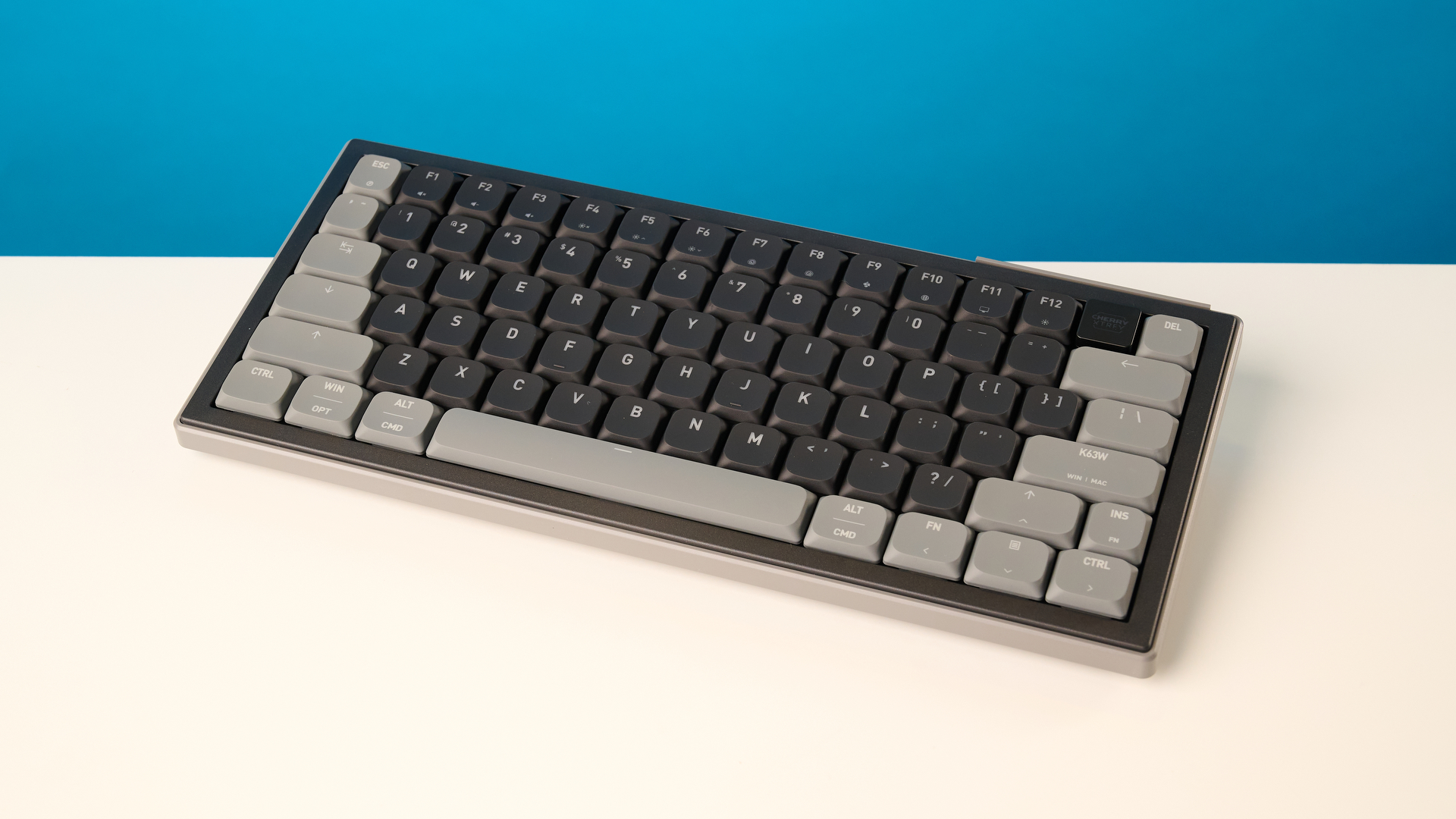 A black Cherry XTRFY K63W Pro Compact mechanical gaming keyboard