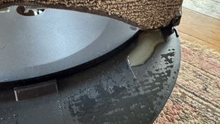 Water left on top of the Roomba Combo 10 Max after mop pad has shifted off