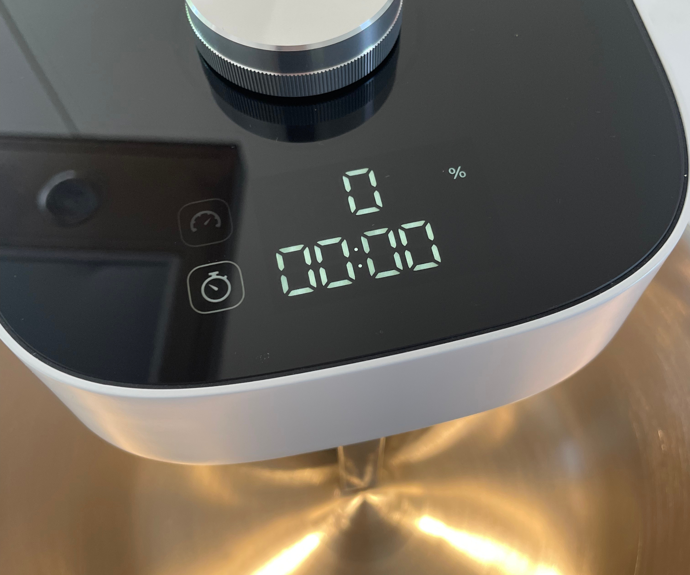 The touchscreen control panel on the Ooni Halo Pro Spiral Mixer