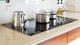 an induction hob with stainless steel induction pans