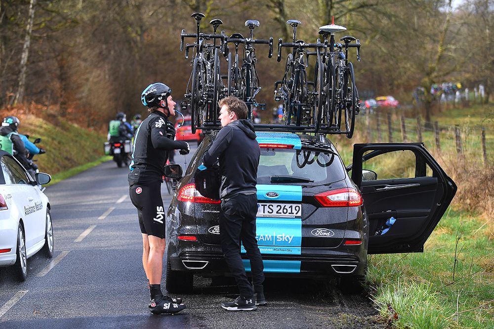 Luke Rowe stops at the team care during stage 1 in Paris-Nice