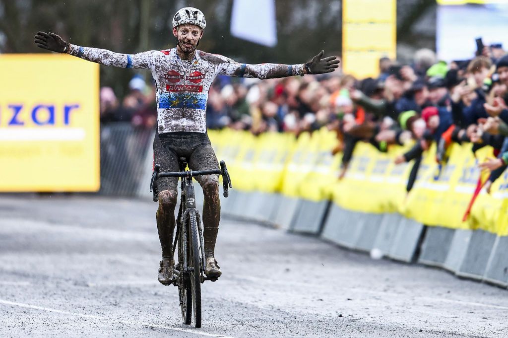 Belgian Michael Vanthourenhout celebrates as he crosses the finish line to win the Men's Elite race at the UCI World Cup cyclocross competition in Gullegen on January 6, 2024. (Photo by DAVID PINTENS / Belga / AFP) / Belgium OUT