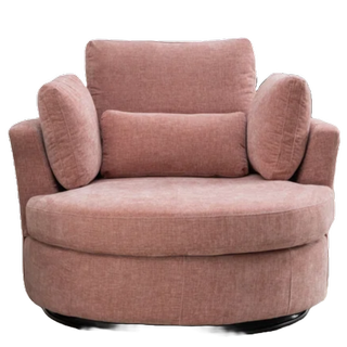 a pink round lounge chair with four little pillows