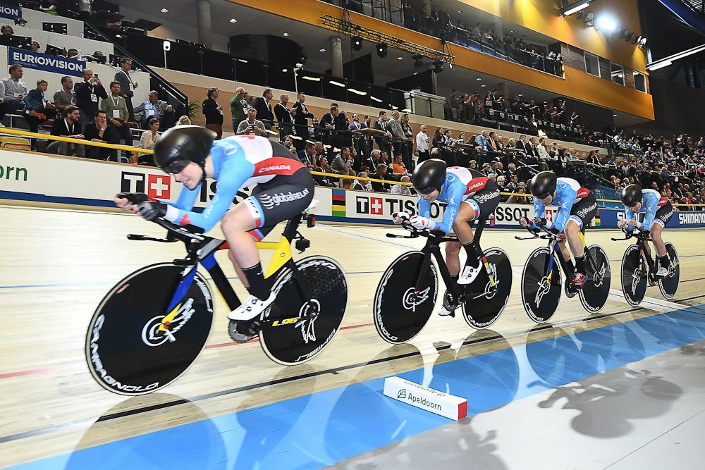Canada's team members compete in the women's pursuit bronze medal race during the UCI Track Cycling World Championship