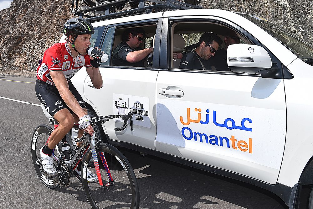 Edvald Boasson Hagen gets a drink at the team car.