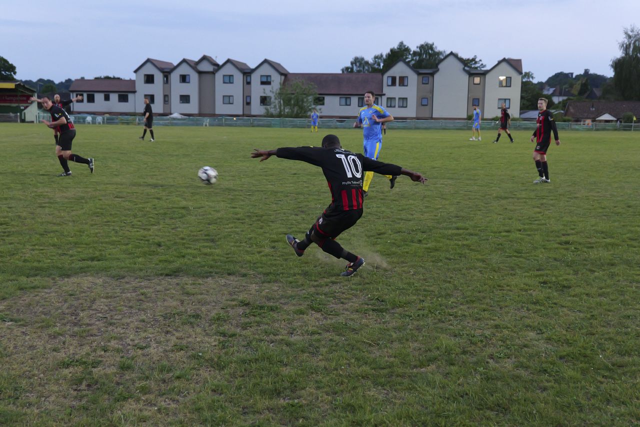 Panasonic Lumix S1 II sample gallery: footballers in action during game at last light