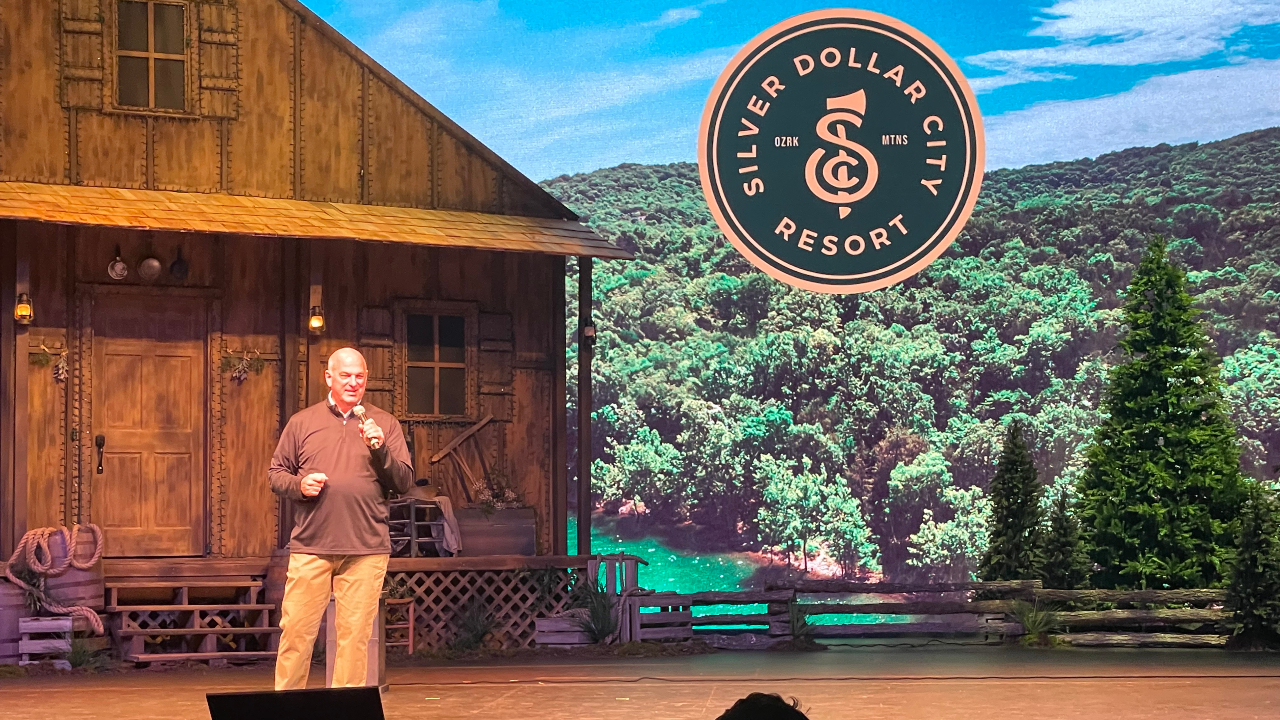 Silver Dollar City President Brad Thomas unveils the resort logo at Fan Fest.