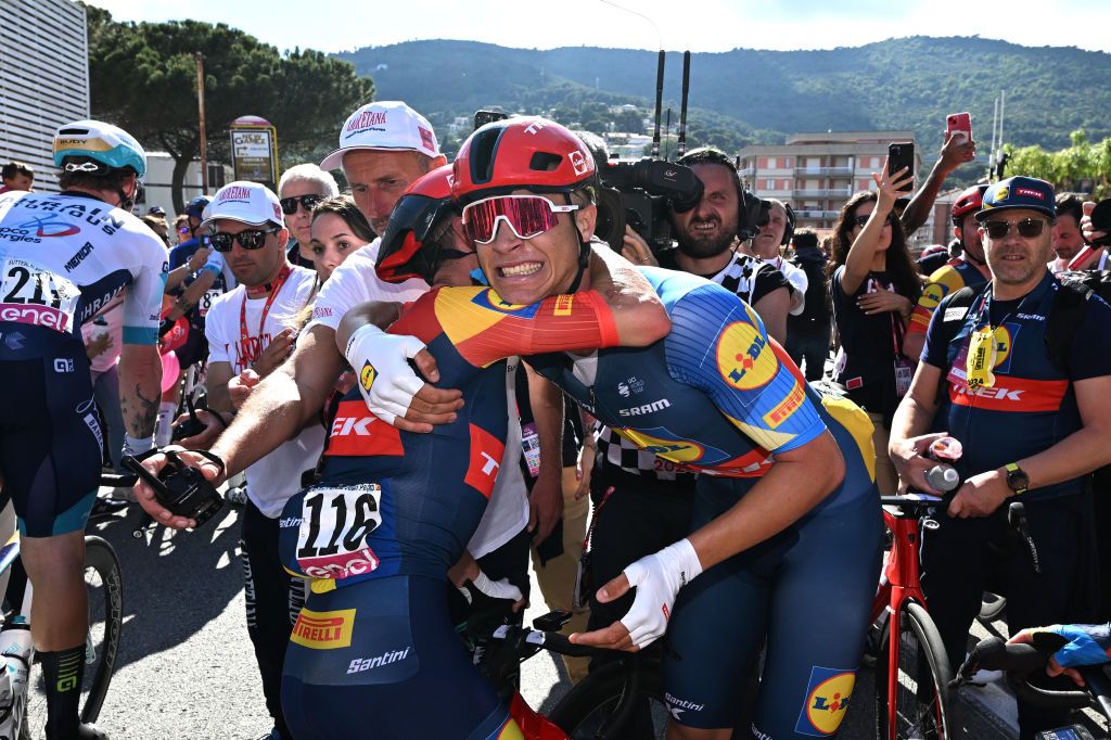 ANDORA ITALY MAY 07 LR Juan Pedro Lopez of Spain and stage winner Jonathan Milan of Italy and Team Lidl Trek react after the 107th Giro dItalia 2024 Stage 4 a 190km stage from Acqui Terme to Andora UCIWT on May 07 2024 in Andora Italy Photo by Fabio Ferrari PoolGetty Images