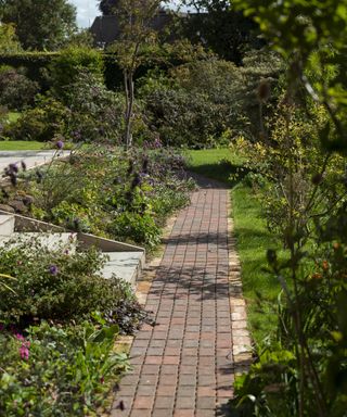 A simple block paving pathway in a garden