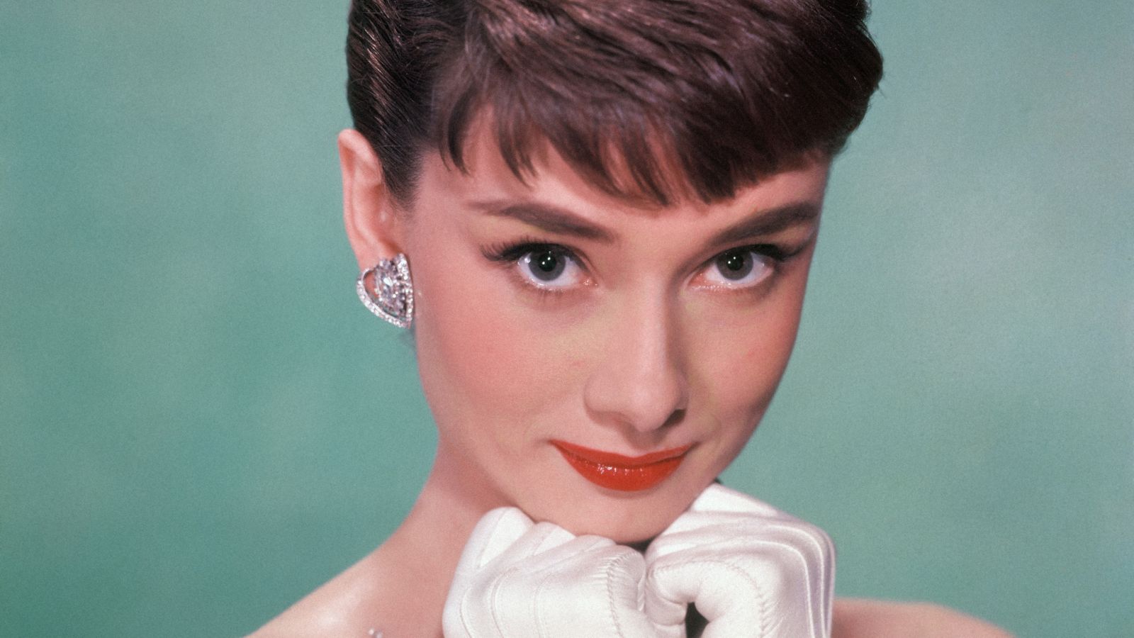 audrey hepburn on a blue background