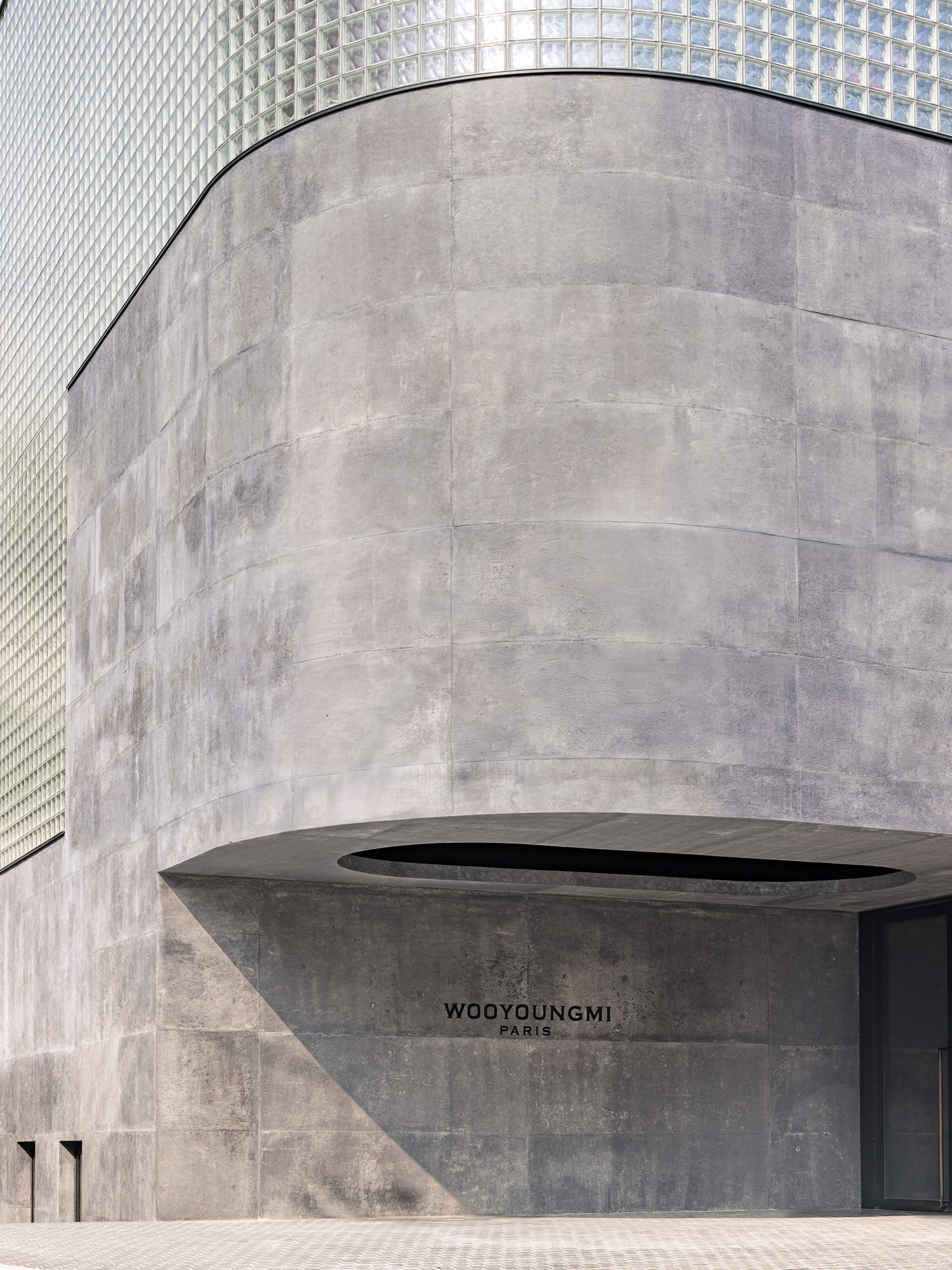 views of Wooyoungmi flagship story in Korea, raw concrete and minimalist design
