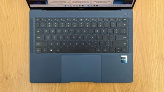 Huawei Matebook X Pro (2022) review: laptop keyboard up close on wooden table