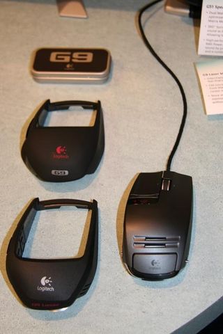 The G9 Laser Mouse comes with two inter-changeable grips - the Wide Load Grip (left) and the Precision Grip (attached to the mouse).