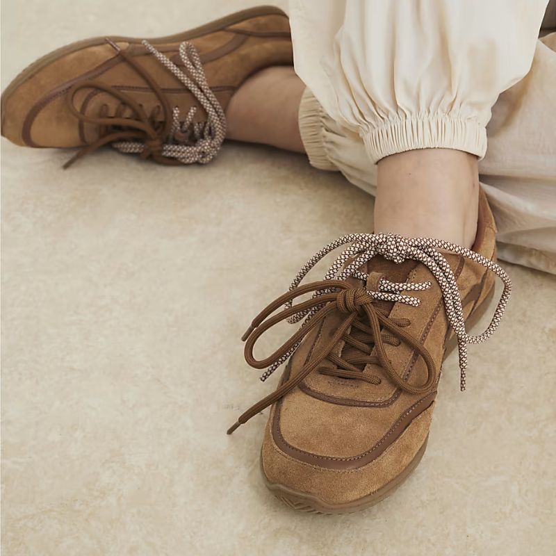 Suede trainers on model 