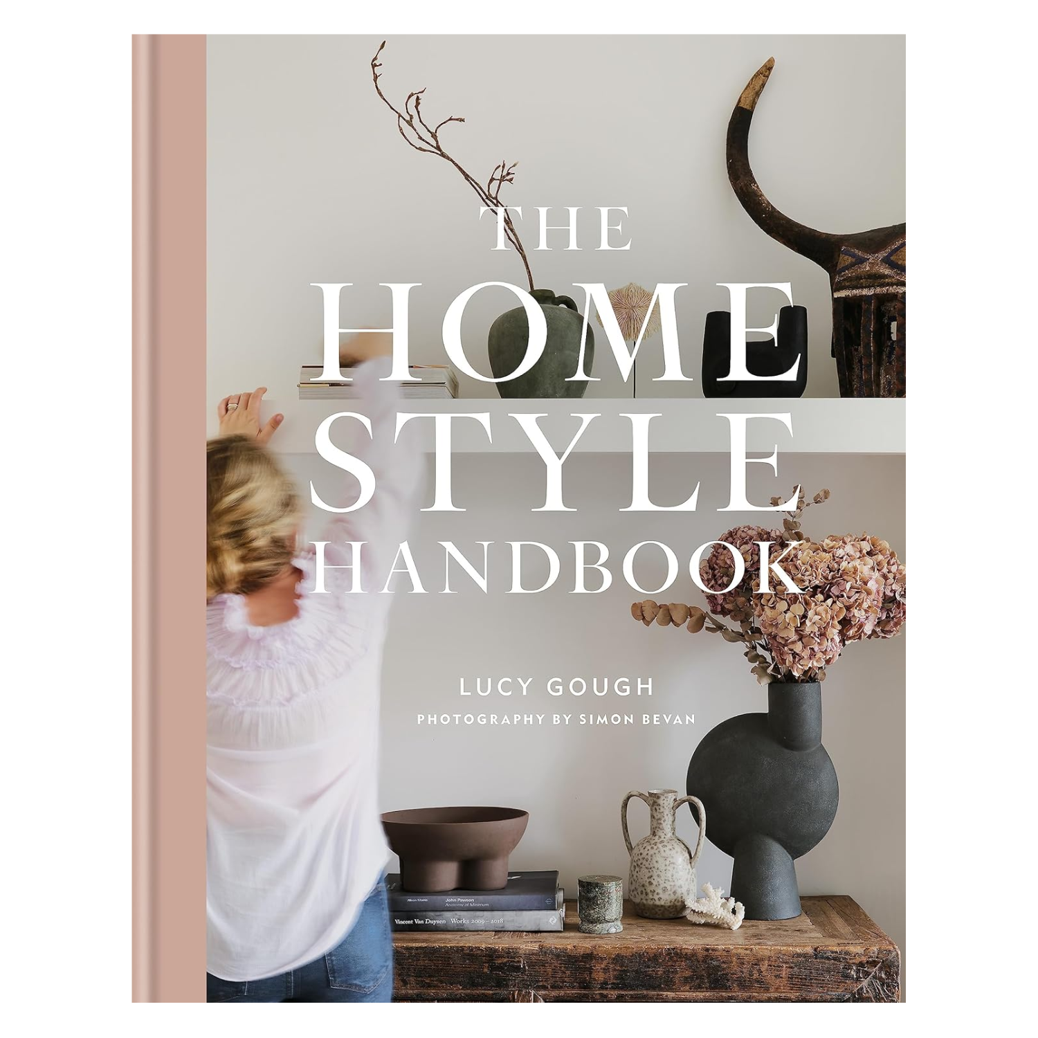 An interiors hardcover book titled 'The Home Style Handbook' by Lucy Gough
