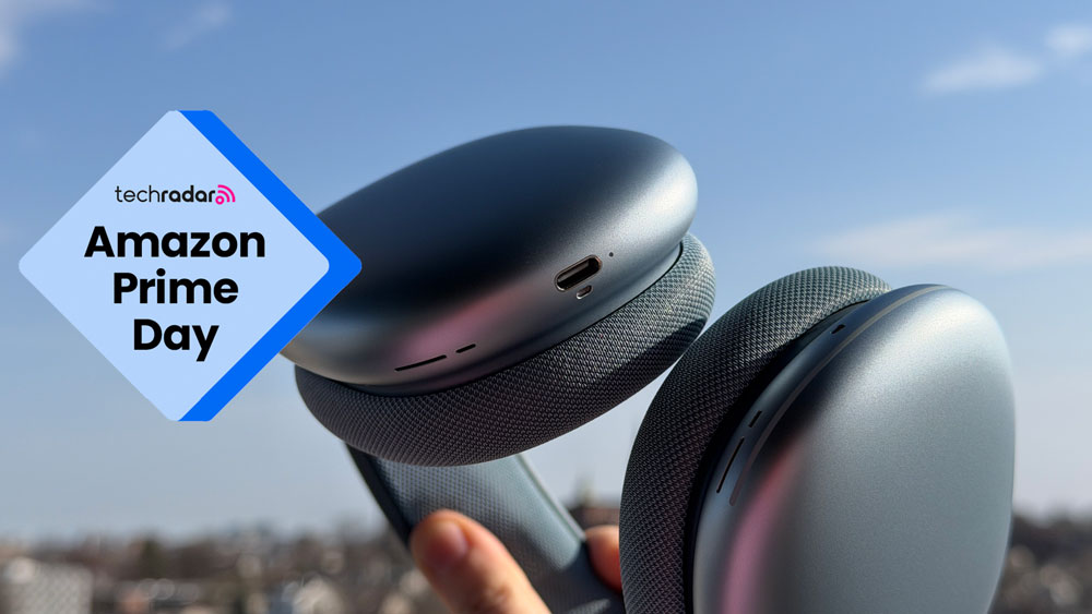 Blue Apple AirPods Max 2 being held in the air, with an Amazon Prime Day badge on the left.