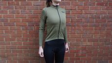 Female cyclist wearing the GripGrab Women’s Gravelin MerinoTech Thermal Long Sleeve Jersey