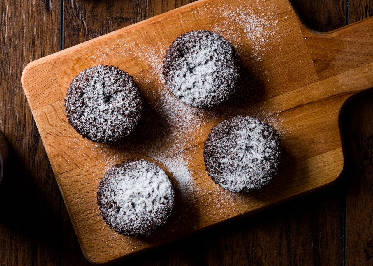 Microwave chocolate puddings decorated with icing sugar