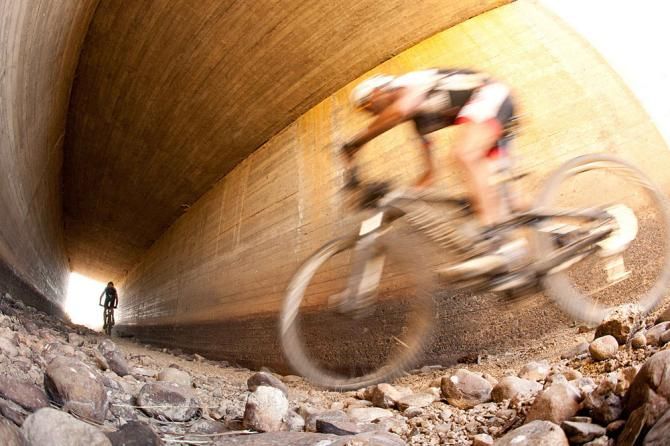 Riders head under the road