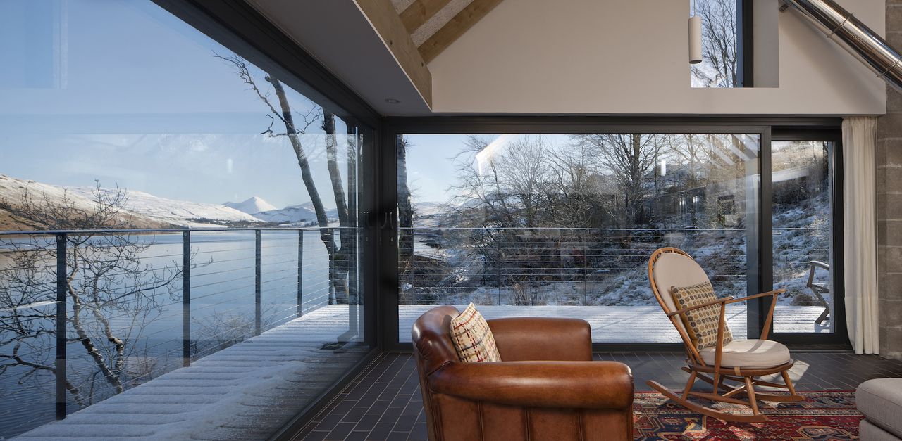 Furniture pieces include an Ercol dining room suite and Wesley Barrell cherry wood table and chairs